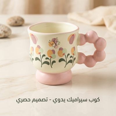 مج بتصميم سيراميك يدوي استثنائي." ​ ​" ​"Your coffee deserves a better home. Upgrade your morning with our unique ceramic mug."