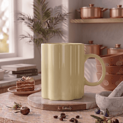 كوب سيراميك مضلع باللون الأصفر الباستيل.  & : Pastel Yellow Ribbed Ceramic Mug.