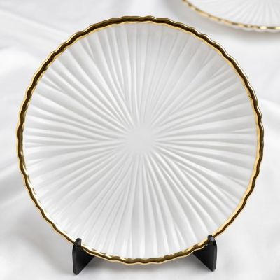  طبق تقديم زجاجي أبيض مضلع بإطار ذهبي فاخر& Premium White Fluted Glass Serving Plate with Gold Rim.