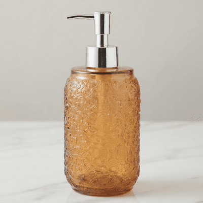: موزع صابون زجاجي بتصميم زخرفي باللون الكهرماني.& : Amber Decorative Glass Soap Dispenser.