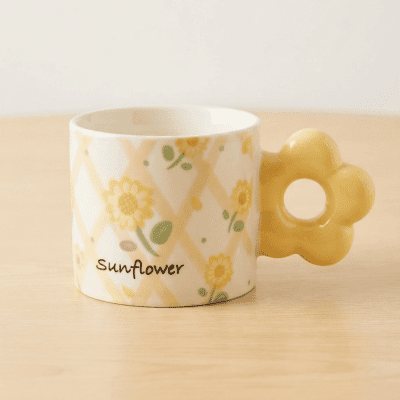 كوب سيراميك بتصميم عباد الشمس (بالقطعة).  بالإنجليزية: Sunflower Ceramic Mug (by the piece).