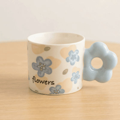 : كوب سيراميك بنقوش الزهور (بالقطعة). & Floral Design Ceramic Mug (by the piece).