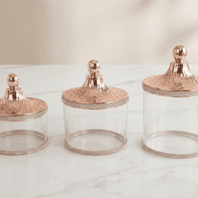 طقم علب تخزين زجاجية بغطاء ذهبي وردي مرصع 3 قطع  .&  Glass Storage Jar Set with Rose Gold Embellished Lid (by the piece).