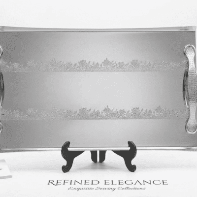 صينية تقديم فاخرة مستطيلة - ستانلس ستيل فضي بسطح مرآة ونقوش دانتيل ليزر.Luxury Rectangular Serving Tray - Silver Stainless Steel Mirror Finish with Laser Lace Pattern.