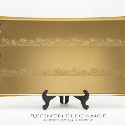 صينية تقديم فاخرة مستطيلة - ذهبي بسطح مرآة ونقوش دانتيل   Luxury Rectangular Serving Tray - Gold Mirror Finish with Laser Lace Pattern.