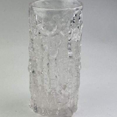 Nordic Ice-Textured Glass Cylinder Vase Bring a touch of modern sophistication and natural elegance into your living space with this exquisite Ice-Textured Glass Vase. Inspired by the raw beauty of frozen glaciers and natural tree bark, this unique piece 