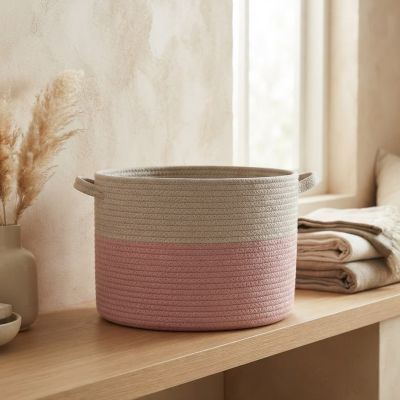 سلة تنظيم وتنظيف دائرية منسوجة بلونين (بيج ووردي) مع مقابض جانبية.  & : Two-Tone Woven Cotton Rope Storage Basket (Beige & Dusty Pink) with Handles.