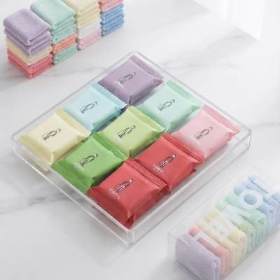 إليكِ تفاصيل المنتج الموضح في الصورة باللغتين العربية والإنجليزية:  اسم المنتج / Product Name بالعربية: طقم مناشف مضغوطة صغيره جدا  ومغلفة بشكل فردي 14 قطعة ألوان باستيل مبهجة (Compressed Towel Set - 14 Pcs).  & : 14-Piece Disposable Compressed Towel 