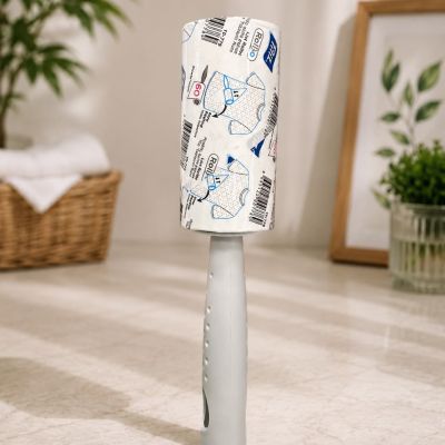 رول / أسطوانة إزالة الوبر والشعر لاصقة للملابس والأثاث مع مقبض مريح.  & : Sticky Lint Roller for Clothes and Furniture with Ergonomic Handle.