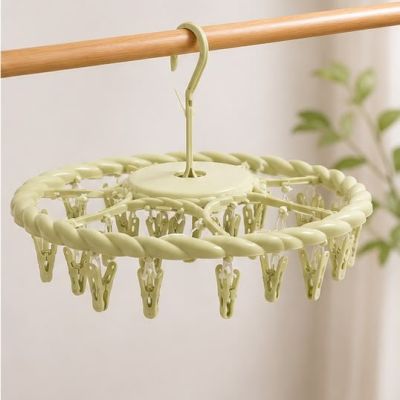 منشر غسيل معلق دائري بلاستيكي بـ 24 ملقطاً ماركة ENWEI (لون أخضر فاتح/باستيل).  & : ENWEI Round Plastic Hanging Laundry Drying Rack with 24 Clips/Pegs (Pastel Green).