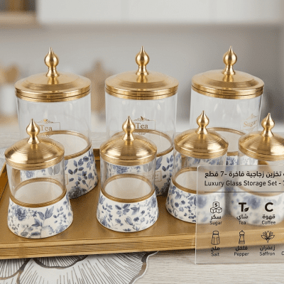 طقم علب توابل وبهارات زجاجي مع صينية ذهبية فاخرة (7 قطع): 7-Piece Glass Spice and Storage Jar Set with Luxury Gold Tray.