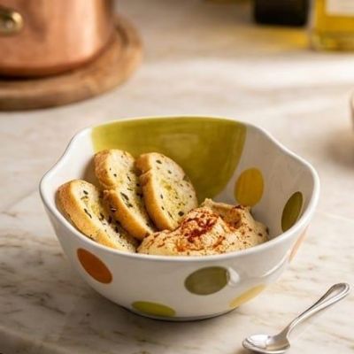Small sauce dish with a simple and elegant design, perfect for 