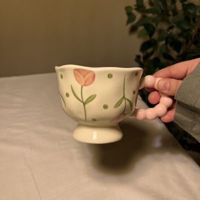 SHEIN handmade ceramic teacup with a floral tulip design and a bubble handle