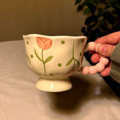 Happiness is a cup of coffee in a cute mug.