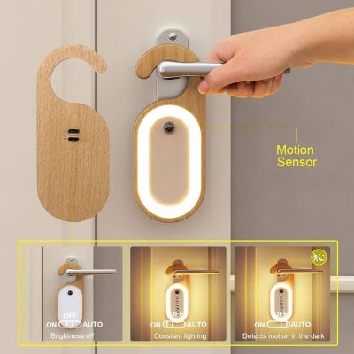 Leapair branded wooden motion sensor night light features a rechargeable design with a hook for hanging directly on door handles