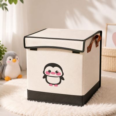 enguin Storage Box 🐧 Material: Durable Non-Woven Fabric Use: Perfect for storing clothes, toys, blankets, and household essentials. Features: Foldable &bull; Spacious &bull; Cute Design &bull; Easy to Carry ✨