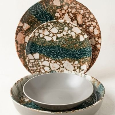 "Earthy textured dinner set. Bold, artisanal style for your table