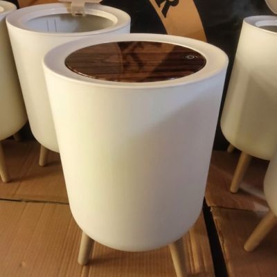 Elevate your space with this minimalist, wooden-accented waste bin. A perfect blend of functional design and refined style. ✨