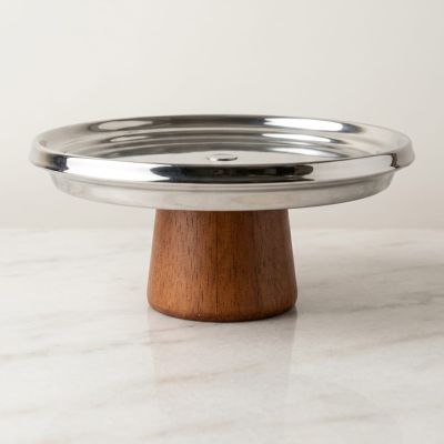 Elevate your presentation with this elegant wooden and metallic serving stand.