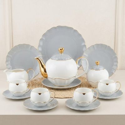 Serenity in a cup. Make every sip feel like a special occasion with this exquisite tea set. The perfect blend of beauty and grace