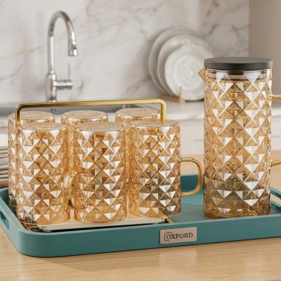 Serve in style. ✨ Elevate your hosting game with this stunning crystal-textured drinkware set by Oxford. Perfect for refreshing moments