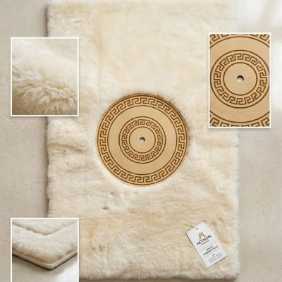 Elevate your space with this ultra-plush cream rug, featuring an elegant Greek key circular medallion. Perfectly neutral, yet undeniably sophisticated.