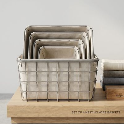 أناقة وبساطة لتنظيم منزلك، طقم سلال معدنية متداخلة ببطانة قماشية." ​By English: "Elegant and simple home organization, nested wire baskets with fabric liner