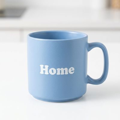 : ابدأي يومك بلمسة دافئة. مج "Home" لقهوتك أو مشروبك المفضل. ☕️  ​English: Start your day with a warm touch. The "Home" mug for your favorite coffee or drink