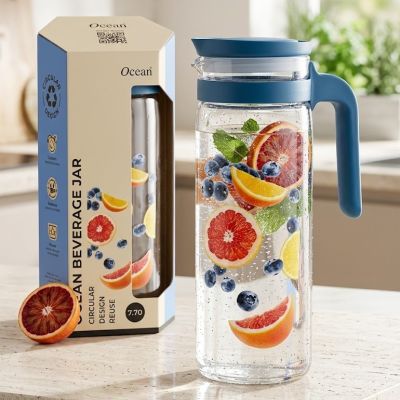 دورق زجاجي (جيك) للمشروبات الباردة مع غطاء ومقبض أزرق.&  Glass Beverage Pitcher with Blue Lid and Handle.